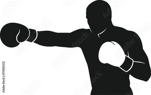 Silhouette of a boxer throwing a powerful punch with determination, ready for combat.