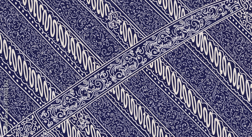 Detailed batik pattern in indigo and white showcasing traditional javanese textile art with intricate floral and geometric designs for cultural and design projects