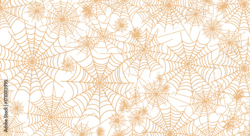 Intricate golden spiderwebs create a delicate and spooky Halloween background pattern