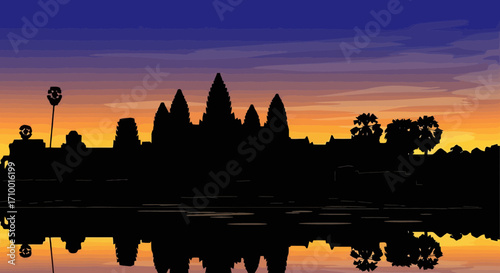 Captivating silhouette of angkor wat at sunset reflecting in the water providing a serene and cultural travel destination for travel posters and educational materials