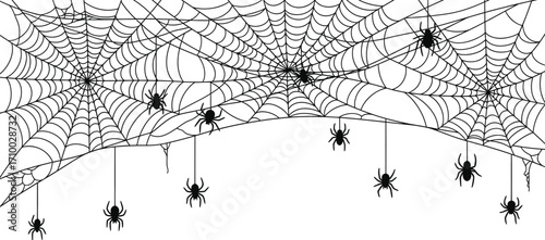 Spooky spiderwebs with dangling spiders create a creepy Halloween atmosphere