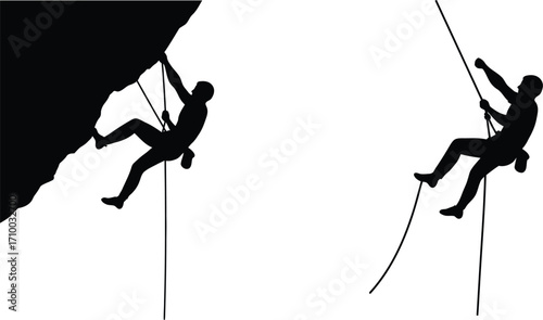 Silhouetted rock climbers ascending a steep cliff face with ropes