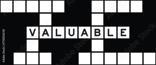 Alphabet letter in word valuable on crossword puzzle background