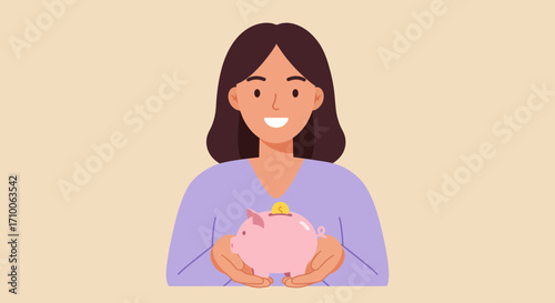 Woman holding a pink piggy bank with a coin.