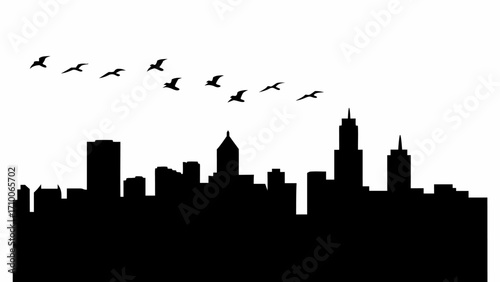 Silhouette of a city skyline with various buildings and a flock of birds flying above the cityscape view