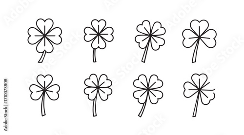 Collection of hand drawn four leaf clover silhouettes for good luck