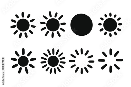 Graphic display showing various sun symbols with different styles and sizes on a white background