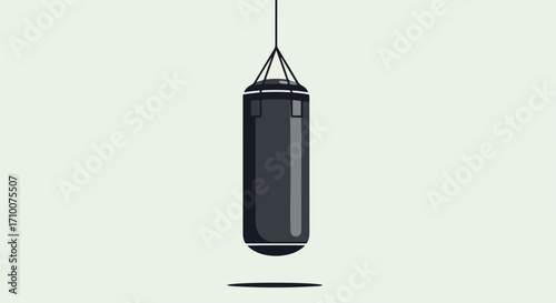 Dark gray punching bag hangs from rope, ready for intense training. Professional punching bag serves as durable exercise equipment, essential for martial arts practice, boxing workouts.