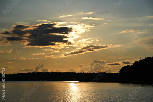 Fototapeta Naklejka Na Ścianę i Meble -  Mazury. Jezioro Kisajno w blasku zachodzącego słońca. Poland.