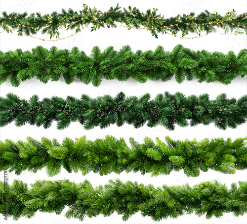 Set of Christmas festive garland with green pine branche isolated on a white background. Fir green branches are decorated. Christmas decor. AI generation