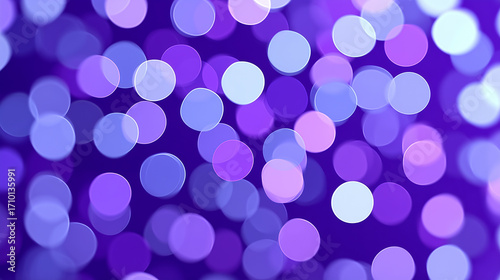 Abstract purple and blue glowing dots background.