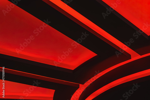 Wallpaper Mural Red illuminated ceiling design with glowing geometric lines in a dark interior. Concept of cinema, architecture, modern design. Bright background Torontodigital.ca