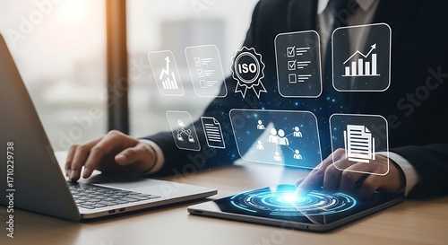 Businessman Using Digital Tablet for ISO Certification and Business Management, Quality Standards and Corporate Compliance.