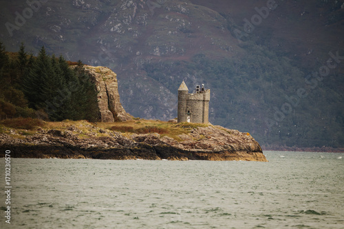 Lighthouse Tower on Rocky Scottish Coastline