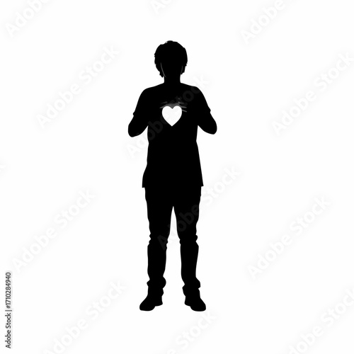 Silhouette of a person holding a glowing heart for organ donation isolated on white background