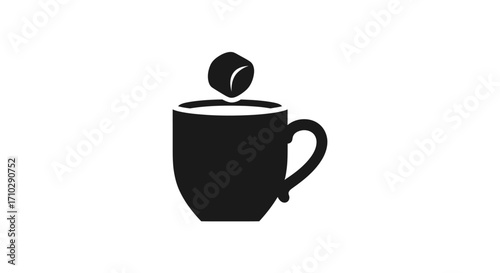 Black silhouette of a coffee cup with a marshmallow dropping into it.