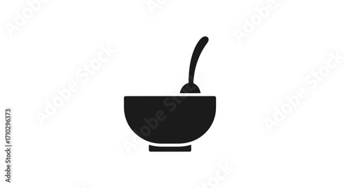 Simple bowl of food with a spoon ready to eat for breakfast or dinner.