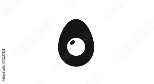 Black egg with white yolk inside.