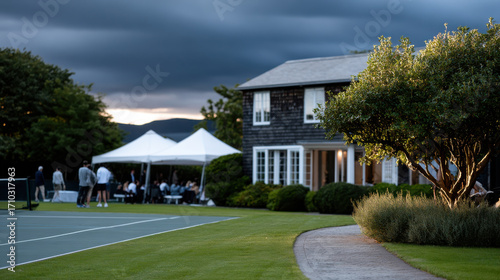 An inviting backyard tennis scene captures the essence of friendly competition and relaxation with family and friends in a picturesque outdoor setting.