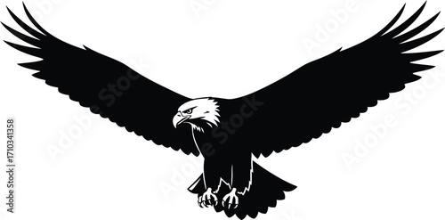 Majestic bald eagle soars with wings spread wide, isolated on white background, a symbol of freedom and power in monochrome silhouette