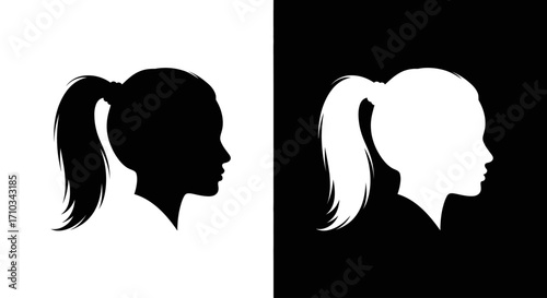 Contrasting black and white profile silhouettes of a young girl with her hair tied in a ponytail.