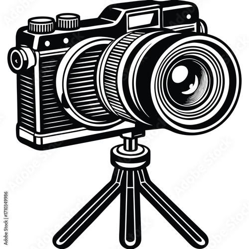 Digital camera with black lens on a metal tripod isolated for studio photography