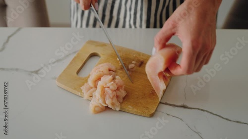 Cooking healthy food at home, woman chopping chicken meat for cutlet or soup. Dietary nutrition for stay healthy and slender, protein diet for sportsmen and people want to lose weight, home cook