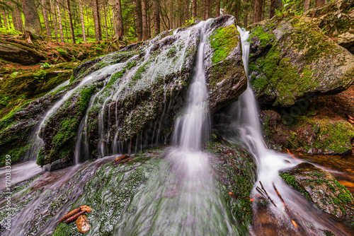 Murais de parede Waterfall cascade in Krkonose National park in Czech republic.