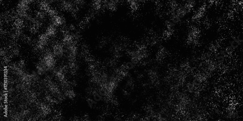 Black with dark gray texture background. Freeze motion of white particles. Black with dark gray texture background. black concrete wall background. Dark cement wall in retro concept.
