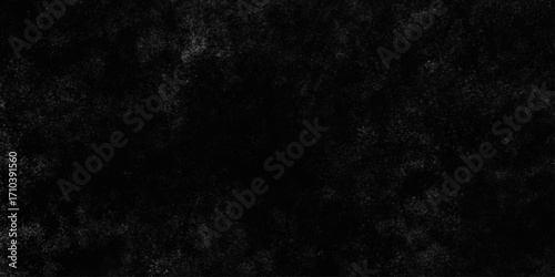 Black with dark gray texture background. Freeze motion of white particles. Black with dark gray texture background. black concrete wall background. Dark cement wall in retro concept.
