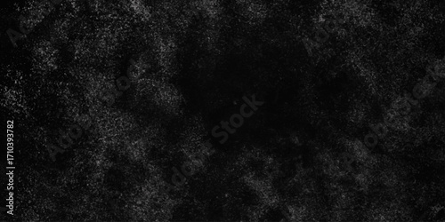 Black with dark gray texture background. Freeze motion of white particles. Black with dark gray texture background. black concrete wall background. Dark cement wall in retro concept.
