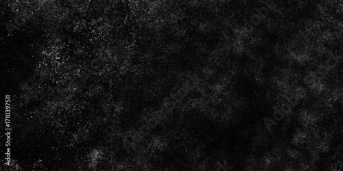 Black with dark gray texture background. Freeze motion of white particles. Black with dark gray texture background. black concrete wall background. Dark cement wall in retro concept.
