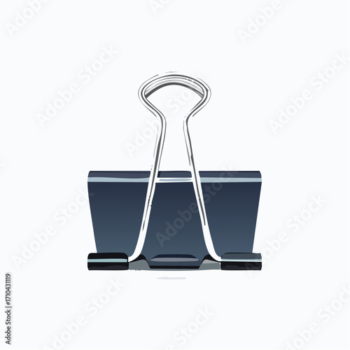 A dark grey binder clip, metallic, isolated on white.