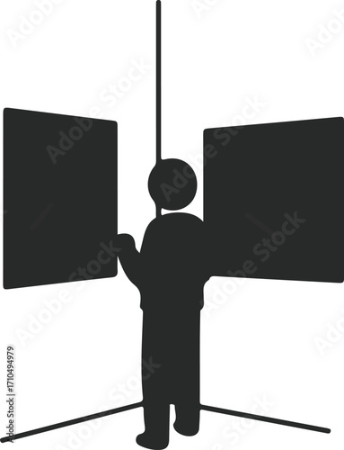 Person viewing artwork in a corner gallery.