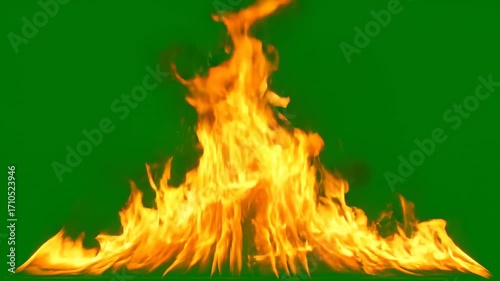 Fiery flames against a green screen
