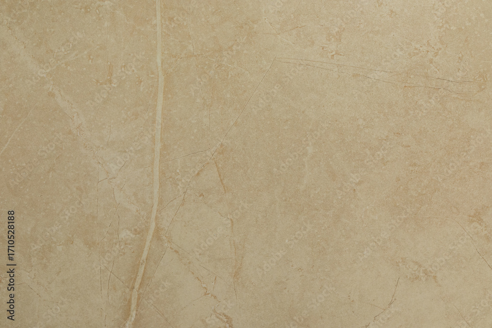Fototapeta premium Elegant beige textured wall surface with subtle patterns and natural stone feel for interior design projects