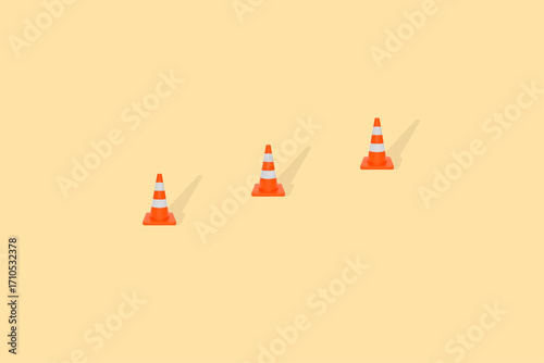 A row of orange and white traffic cones spaced apart on a soft yellow background