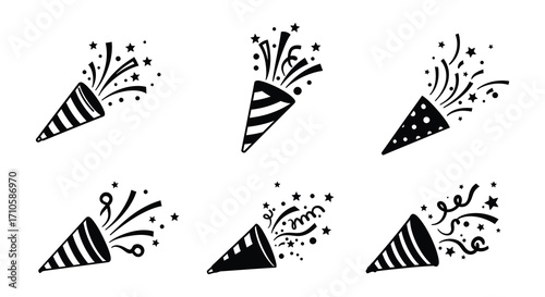 A collection of black and white party poppers with sparkling confetti