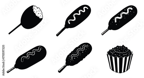 Black and white illustrations of corn dogs and a cupcake design