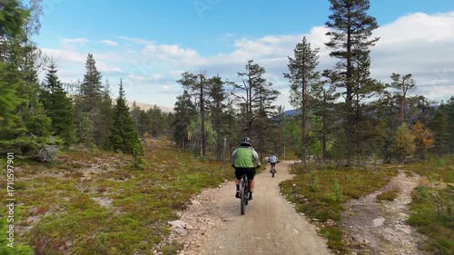Father and Son Mountain Biking in Autumn, Pallas-Yllästunturi National Park, Lapland Finland