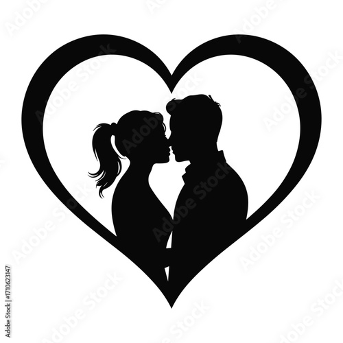 Romantic silhouette of a couple kissing inside a heart shape