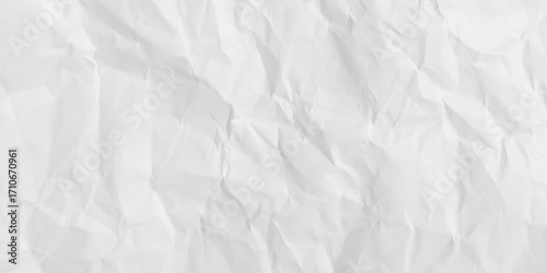 Creative background with scattered overlay of crumpled papers. White crumpled paper texture background, clean white wrinkled paper, top view.
