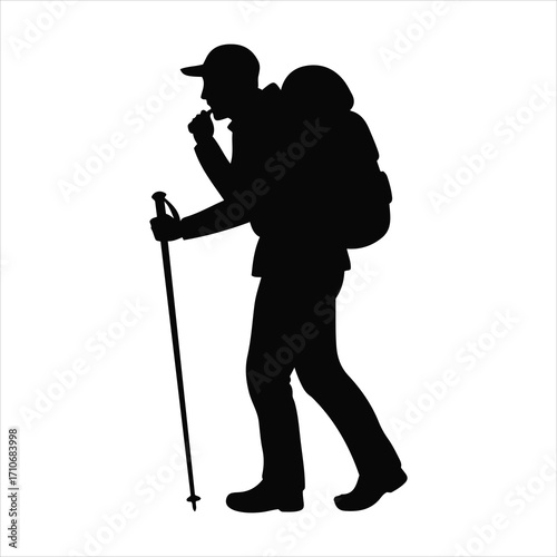 Silhouette of a hiker with backpack and trekking poles exploring wilderness mountains and trails