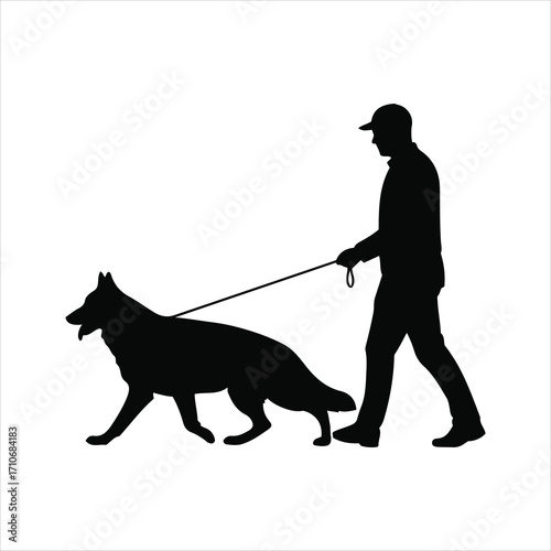 Silhouette of a man walking a german shepherd dog on a leash