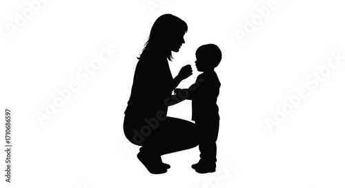Silhouette of a mother and child interacting with affection and tenderness