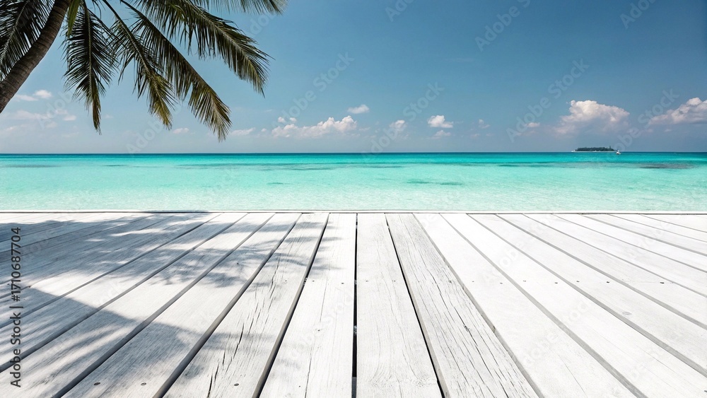 Fototapeta premium Tropical beach view from wooden deck with palm shadow White wooden deck overlooking turquoise tropical ocean with palm tree shadow and island on horizon, perfect for travel and relaxation. 