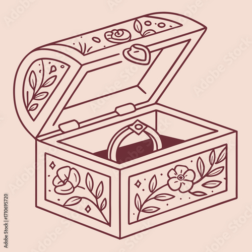 Open jewelry box with ring inside, decorated with floral patterns and diamonds