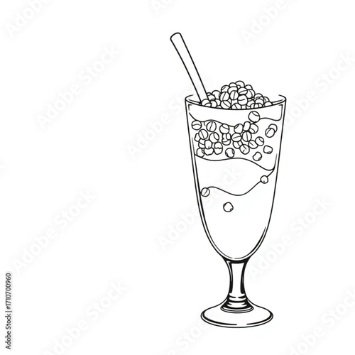 Coconut yogurt parfait with granola in tall glass