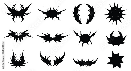 Collection of dark abstract shapes resembling tribal or gothic designs