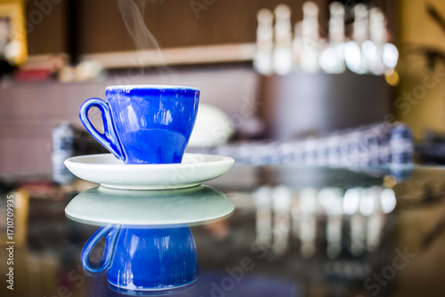Blue coffee cup in coffee shop